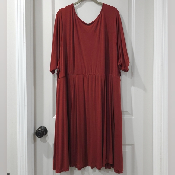 TORRID Short Sleeve Super Soft Knit Mini Skater V-neck Dress, Side Pockets - Picture 9 of 13